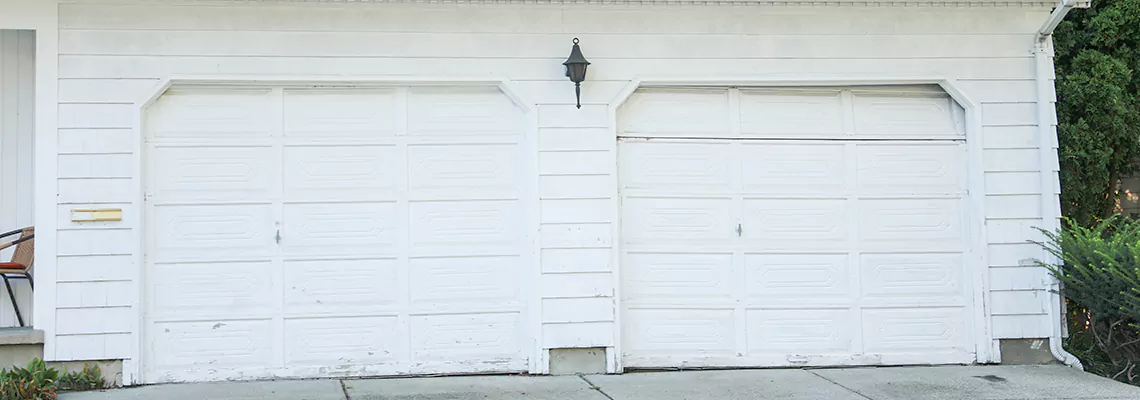 Roller Garage Door Dropped Down Replacement in Hamilton, ON