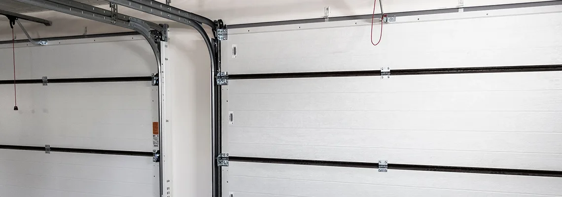 Fix Folding Garage Door Jerking in Hamilton, Ontario