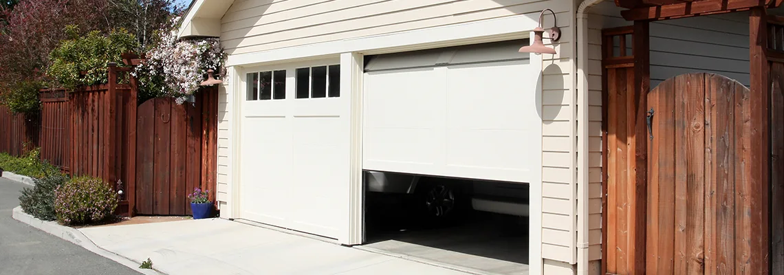 Fix Metal Garage Door Jerking in Hamilton, Ontario